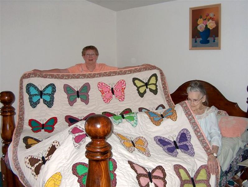 2006-06 Betty shows off Mildred's last quilt